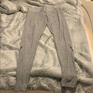 pink leggings with small holes at the bottom